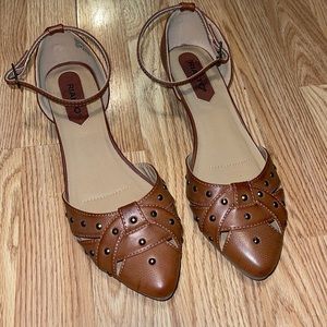 Brown leather flats